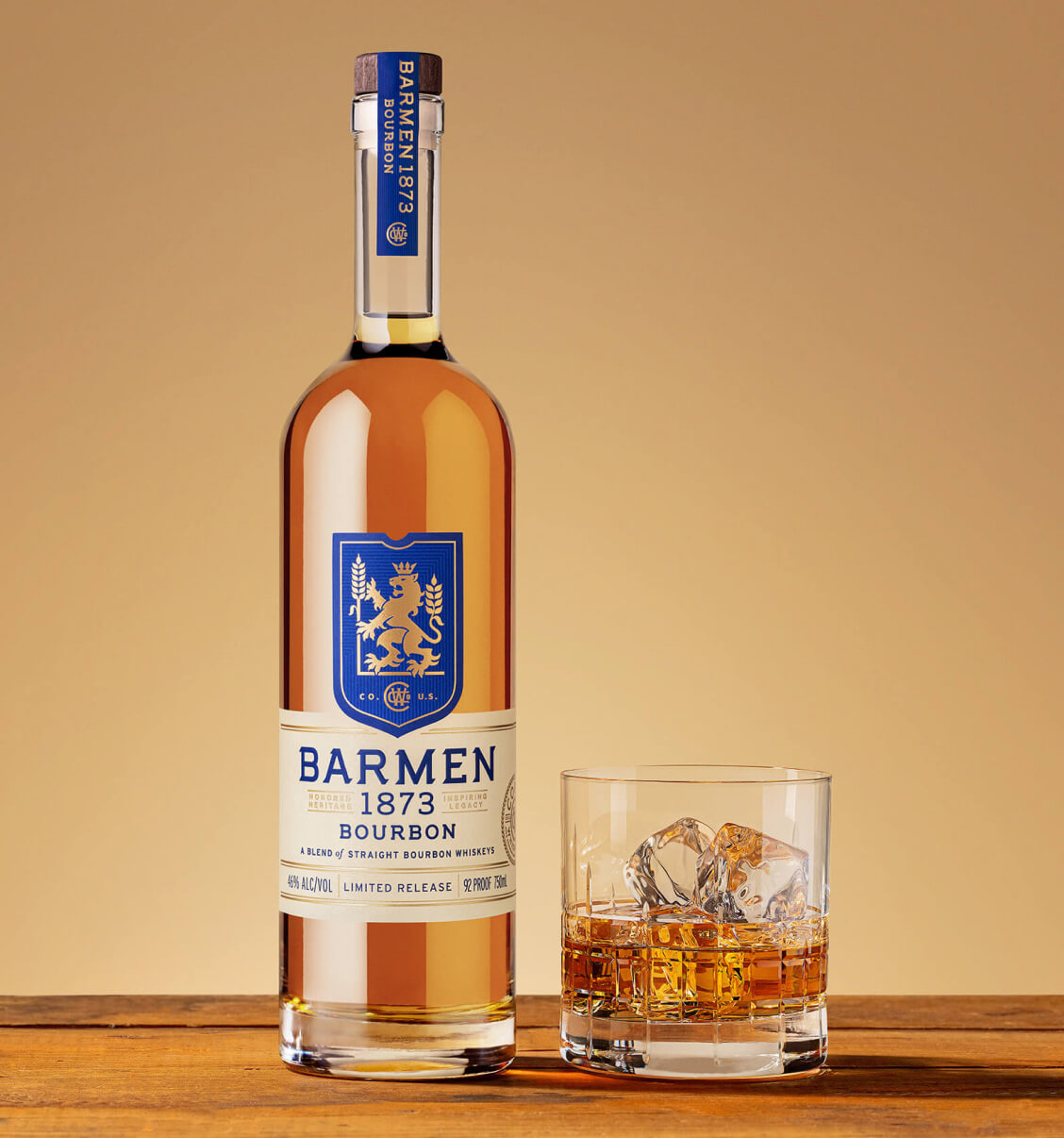 barmen bottle and glass of whiskey